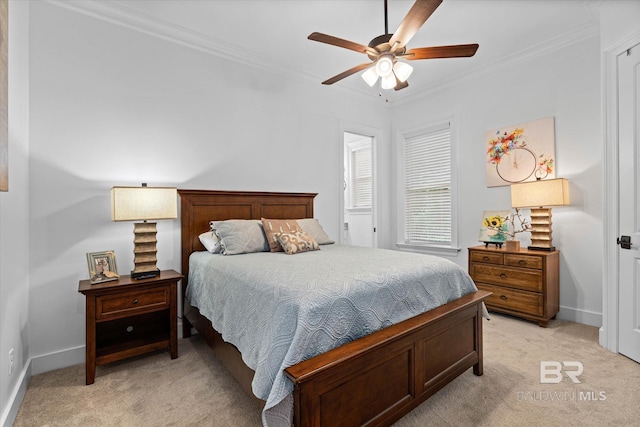 3250 Riviere Du Chien Rd, Mobile, AL 36693 - bedroom featuring light colored carpet, ornamental molding, baseboards, and a ceiling fan