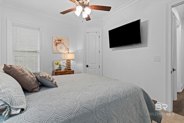 3250 Riviere Du Chien Rd, Mobile, AL 36693 - bedroom with ornamental molding, ceiling fan, and wood finished floors