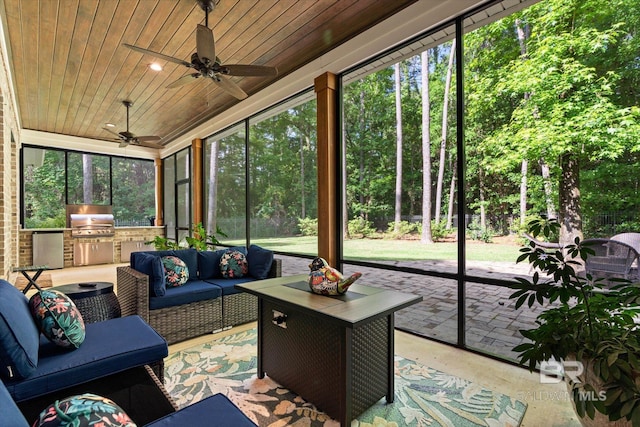 3250 Riviere Du Chien Rd, Mobile, AL 36693 - sunroom featuring area for grilling, a ceiling fan, and outdoor lounge area