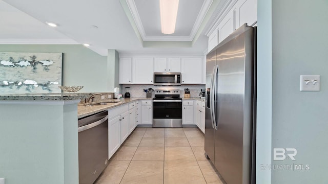 26688 Perdido Beach Blvd Unit 1203, Orange Beach, AL 36561 - kitchen featuring stainless steel appliances, crown molding, light stone counters, backsplash, and white cabinets
