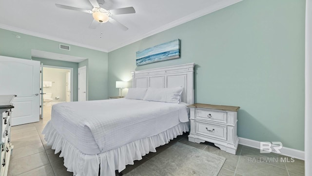 26688 Perdido Beach Blvd Unit 1203, Orange Beach, AL 36561 - tiled bedroom with ornamental molding, ensuite bathroom, and ceiling fan