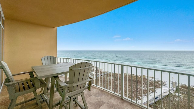 26688 Perdido Beach Blvd Unit 1203, Orange Beach, AL 36561 - balcony featuring view of water and beach and outdoor dining area