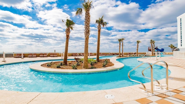 26688 Perdido Beach Blvd Unit 1203, Orange Beach, AL 36561 - community pool featuring a patio area