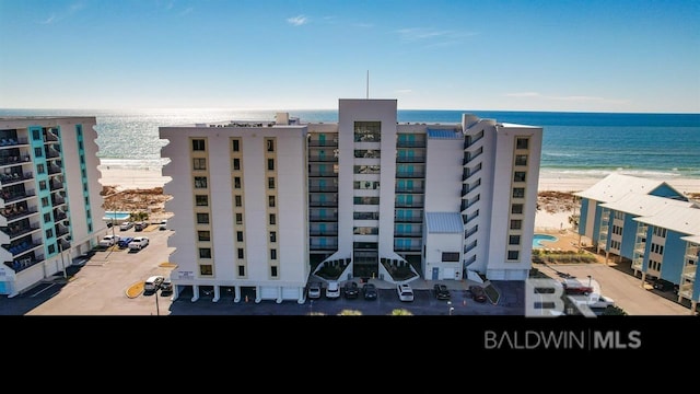 view of building exterior featuring a water view