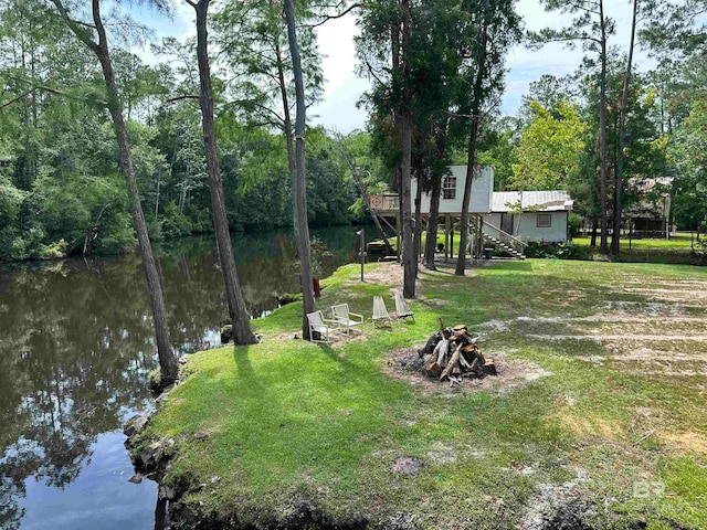 view of yard with a water view