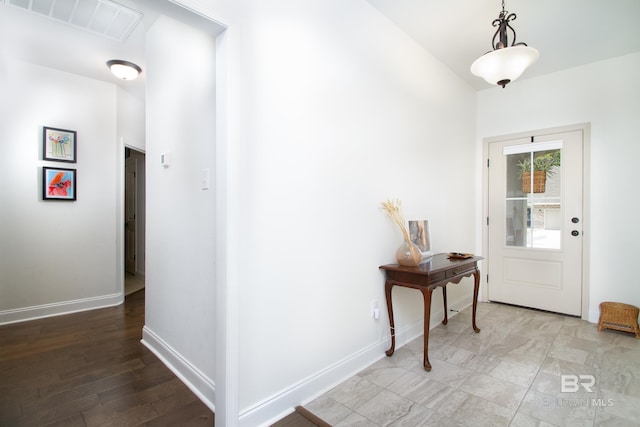 entrance foyer featuring visible vents and baseboards