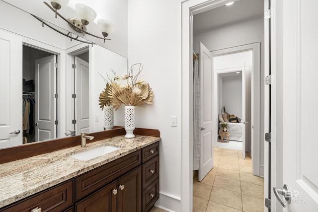 bathroom featuring vanity and tile patterned flooring