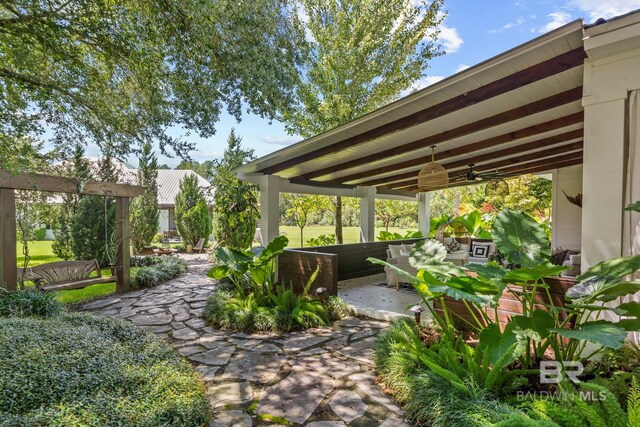 view of patio / terrace featuring outdoor lounge area and ceiling fan