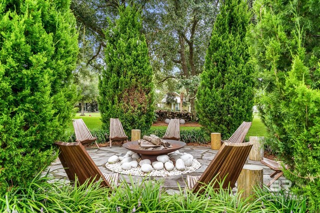 view of patio featuring a fire pit