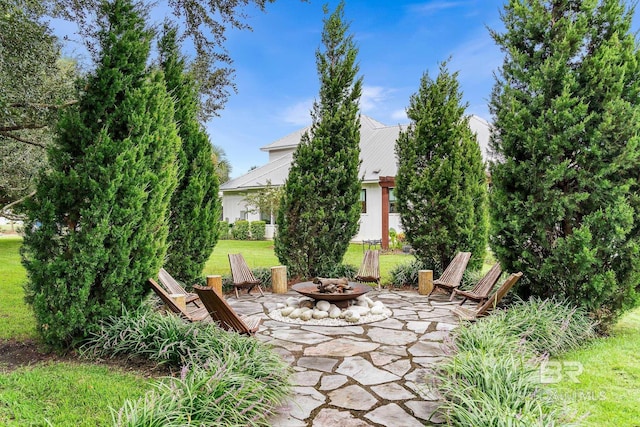 view of patio / terrace with a fire pit