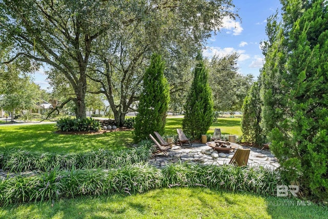 exterior space with a fire pit