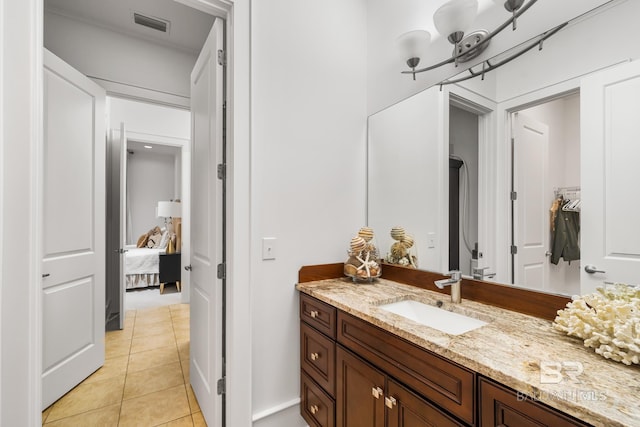 bathroom featuring vanity, tile patterned flooring, and visible vents