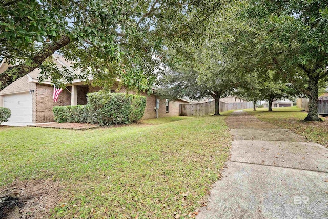 view of yard featuring a garage