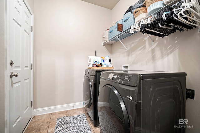 laundry room with separate washer and dryer