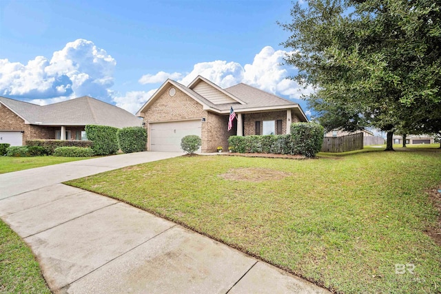 view of front of home featuring a garage and a front yard