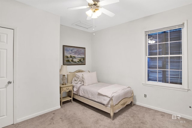 carpeted bedroom with ceiling fan