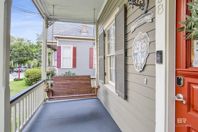 balcony featuring covered porch