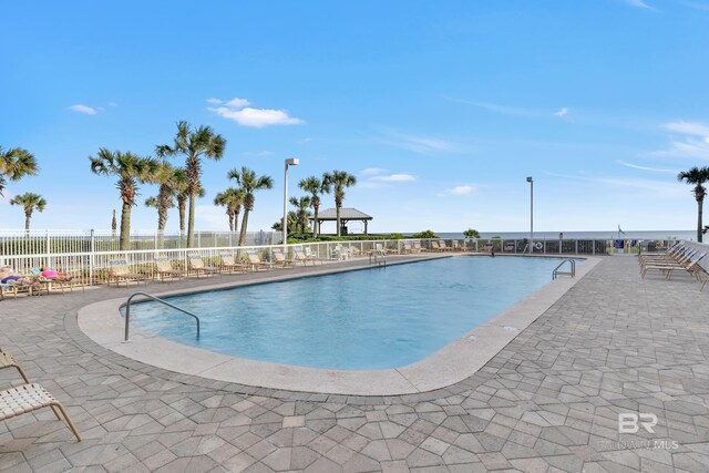 24522 Perdido Beach Blvd Unit 3705, Orange Beach, AL 36561 - view of swimming pool with a patio area and fence
