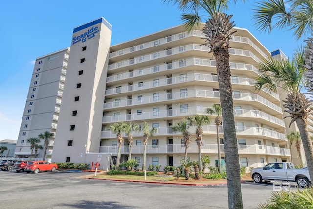 24522 Perdido Beach Blvd Unit 3705, Orange Beach, AL 36561 - view of building exterior with uncovered parking
