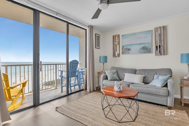 24522 Perdido Beach Blvd Unit 3705, Orange Beach, AL 36561 - living area with a wealth of natural light, a water view, wood finished floors, and ceiling fan