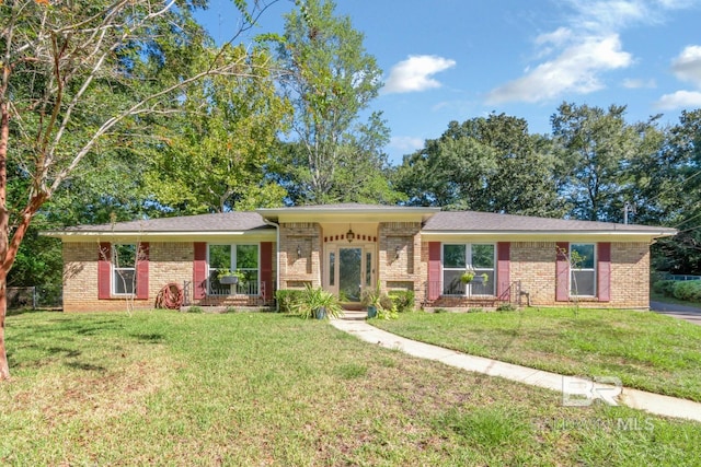 ranch-style home with a front lawn