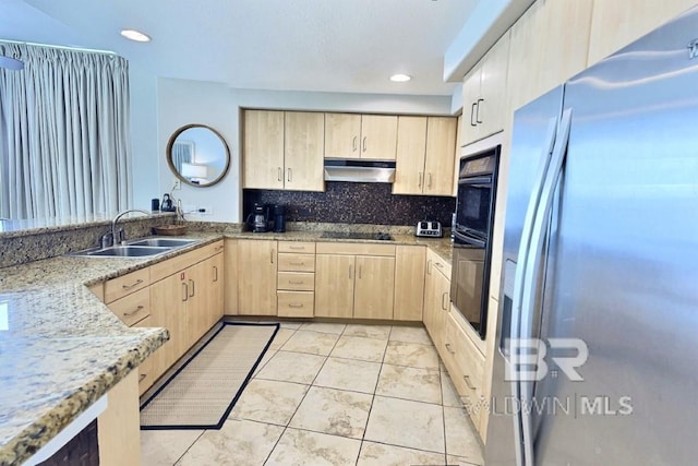 521 W Beach Blvd Unit 1703, Gulf Shores, AL 36542 - kitchen featuring light brown cabinetry, under cabinet range hood, a sink, and black appliances