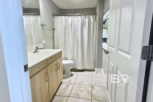 521 W Beach Blvd Unit 1703, Gulf Shores, AL 36542 - full bath featuring vanity, marble finish floor, a shower with shower curtain, and toilet