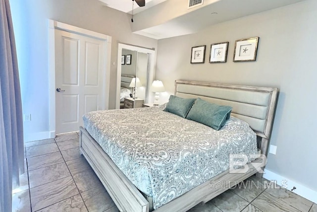 521 W Beach Blvd Unit 1703, Gulf Shores, AL 36542 - bedroom featuring baseboards, visible vents, ceiling fan, and marble finish floor