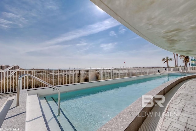 521 W Beach Blvd Unit 1703, Gulf Shores, AL 36542 - pool featuring fence