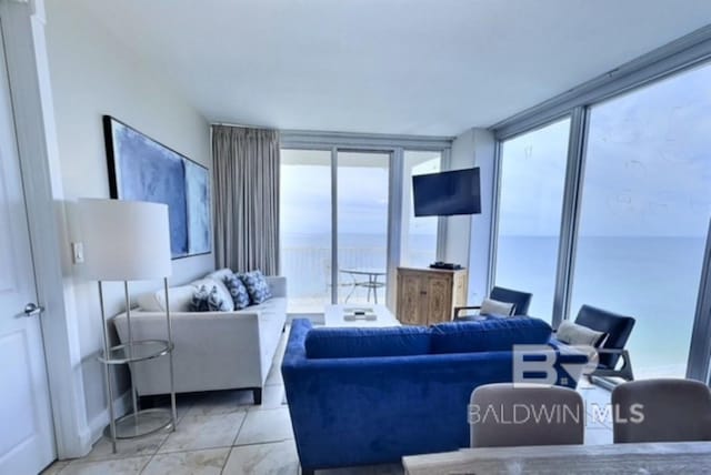 521 W Beach Blvd Unit 1703, Gulf Shores, AL 36542 - living room with floor to ceiling windows