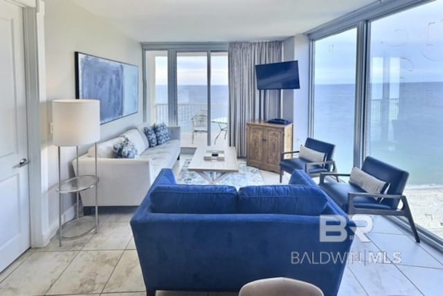 521 W Beach Blvd Unit 1703, Gulf Shores, AL 36542 - tiled living area featuring floor to ceiling windows
