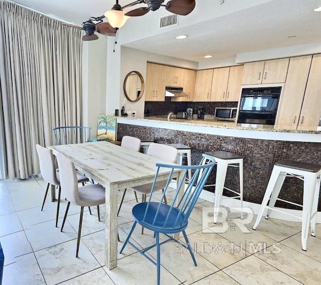 521 W Beach Blvd Unit 1703, Gulf Shores, AL 36542 - dining room featuring a ceiling fan, recessed lighting, light tile patterned flooring, and visible vents
