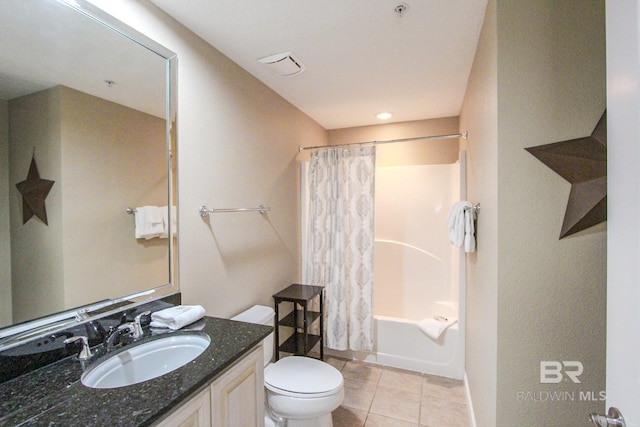 full bathroom featuring vanity, tile patterned floors, shower / tub combo, and toilet