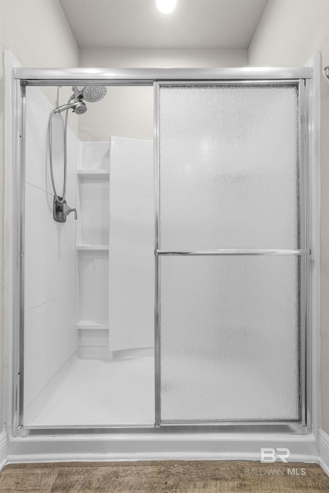 bathroom with an enclosed shower