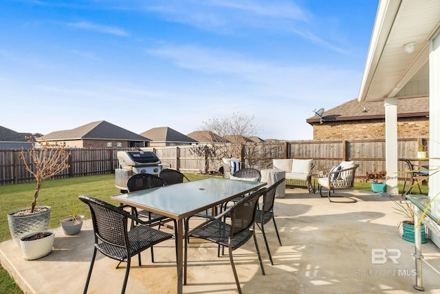 view of patio / terrace with an outdoor living space and a grill