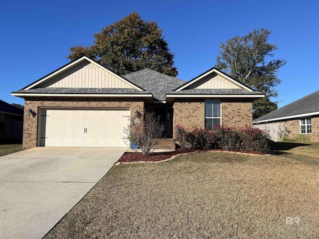 single story home featuring a front lawn and a garage