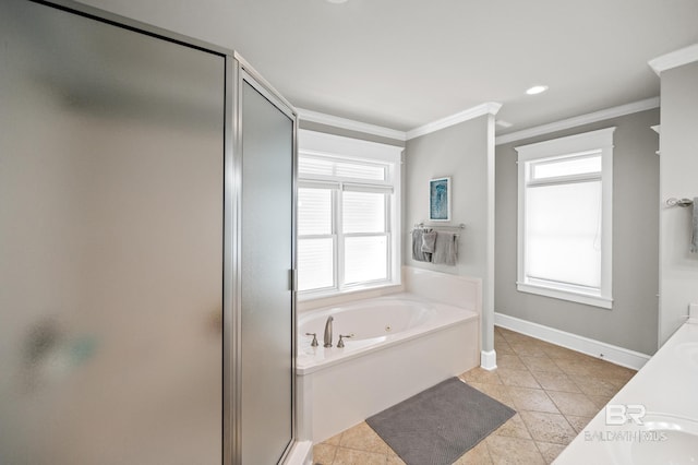 bathroom featuring crown molding, a healthy amount of sunlight, and tile patterned floors