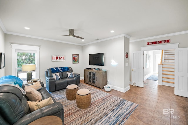 tiled living room with ceiling fan and ornamental molding