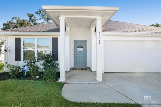 property entrance featuring a garage