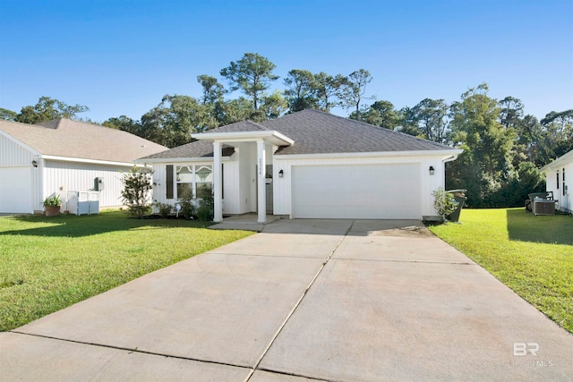 ranch-style home featuring a front yard and a garage