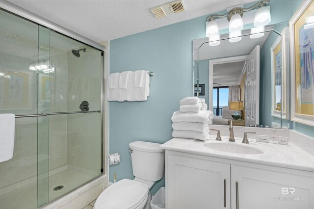 24132 Perdido Beach Blvd Unit 1063, Orange Beach, AL 36561 - full bath with toilet, visible vents, vanity, and a stall shower