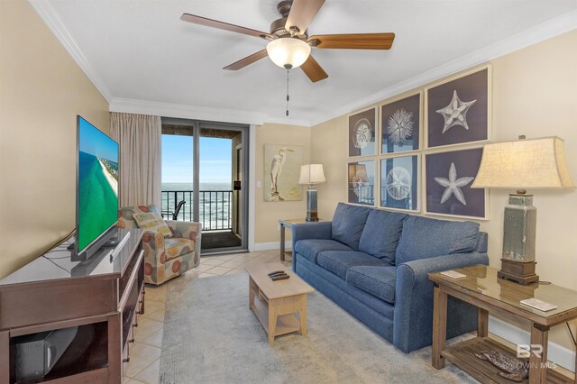 24132 Perdido Beach Blvd Unit 1063, Orange Beach, AL 36561 - living area featuring ceiling fan, baseboards, ornamental molding, and tile patterned floors