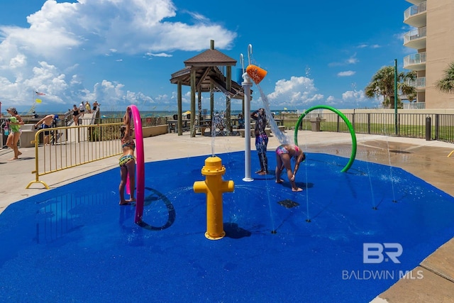 24132 Perdido Beach Blvd Unit 1063, Orange Beach, AL 36561 - view of play area featuring fence and a gazebo