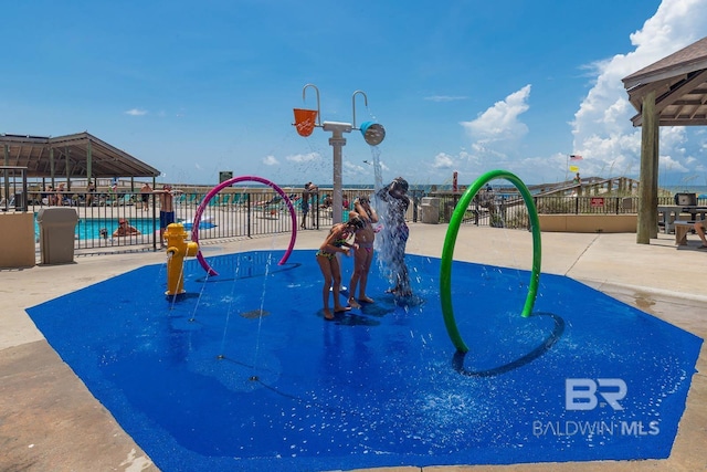 24132 Perdido Beach Blvd Unit 1063, Orange Beach, AL 36561 - view of home's community with fence and a swimming pool
