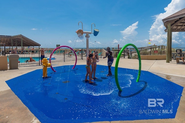 24132 Perdido Beach Blvd Unit 1063, Orange Beach, AL 36561 - surrounding community featuring fence and a swimming pool