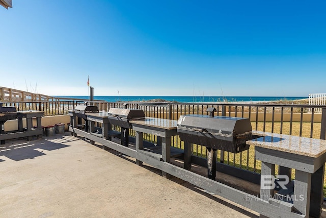 24132 Perdido Beach Blvd Unit 1063, Orange Beach, AL 36561 - view of patio / terrace featuring a water view and a grill