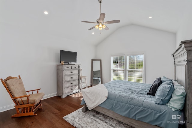 bedroom with ceiling fan, dark hardwood / wood-style flooring, and vaulted ceiling