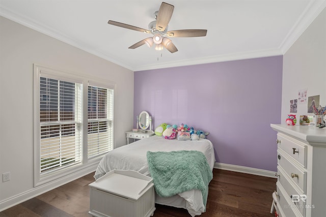 bedroom with crown molding, dark hardwood / wood-style floors, and ceiling fan