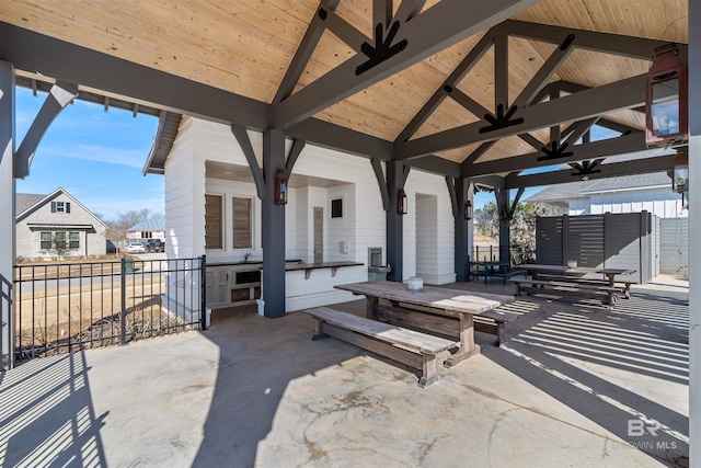 view of patio / terrace featuring a gazebo and ceiling fan