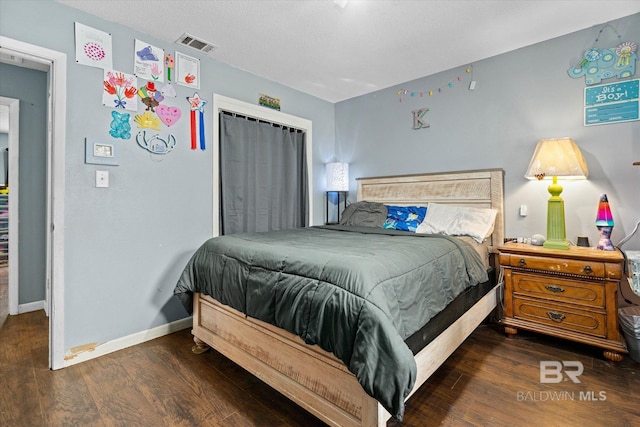 814 Taylor St, Bay Minette, AL 36507 - bedroom featuring wood finished floors and a closet
